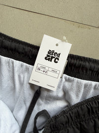 NIKE BAGGY TRACK PANT47 - M