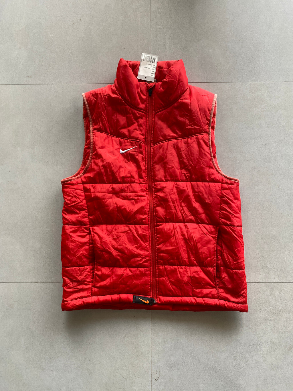 NIKE SLEEVE LESS PUFFER JACKET - M