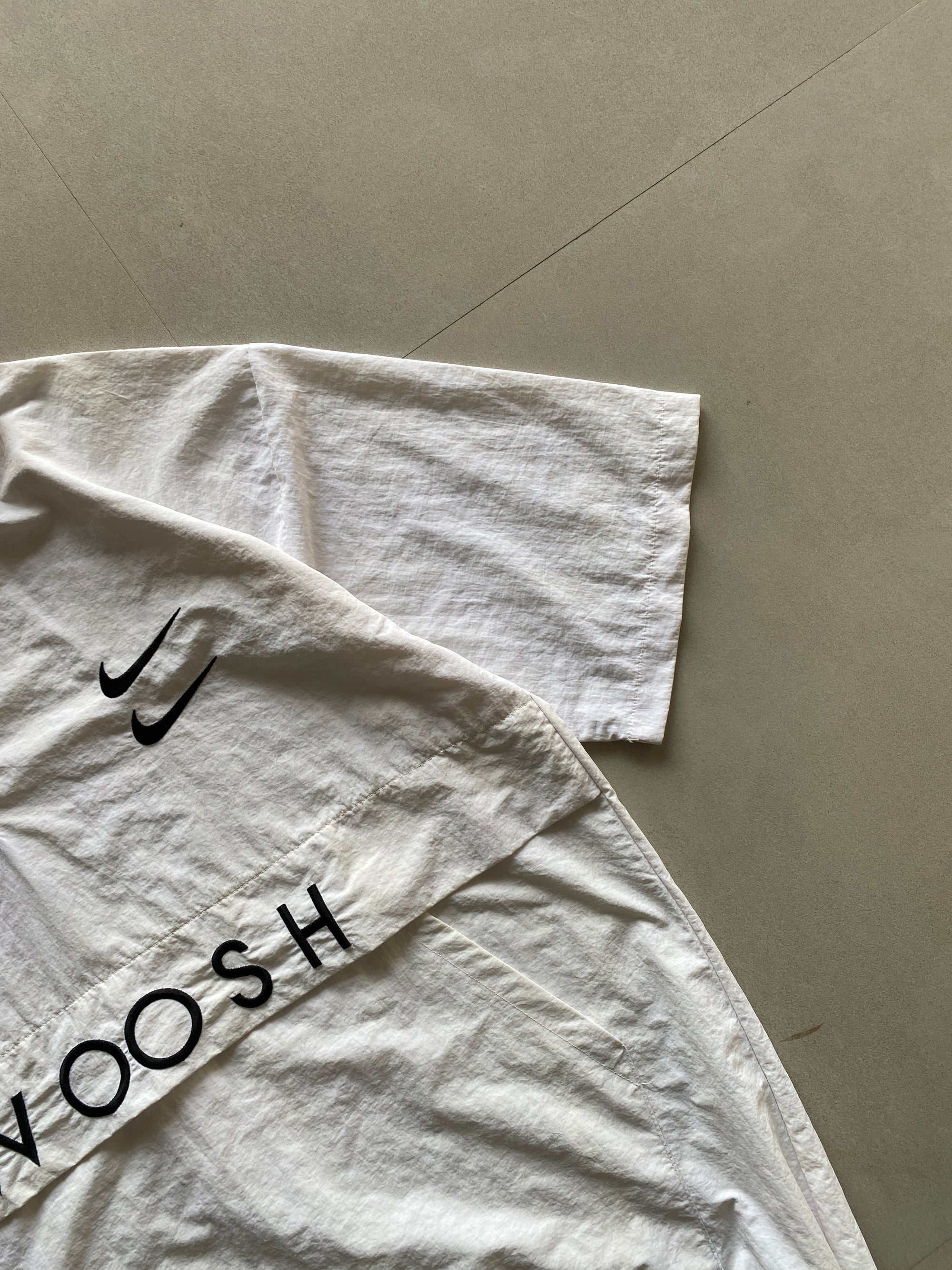 NIKE SWOOSH HALF SLEEVE JACKET ( BOOTLEG) - XL