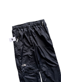 Aged Arc black The North Face HyVent waterproof nylon rain pants with zippered pockets and elastic waistband