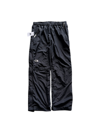 Aged Arc black The North Face HyVent waterproof rain pants with an elastic waistband and zippered pockets.