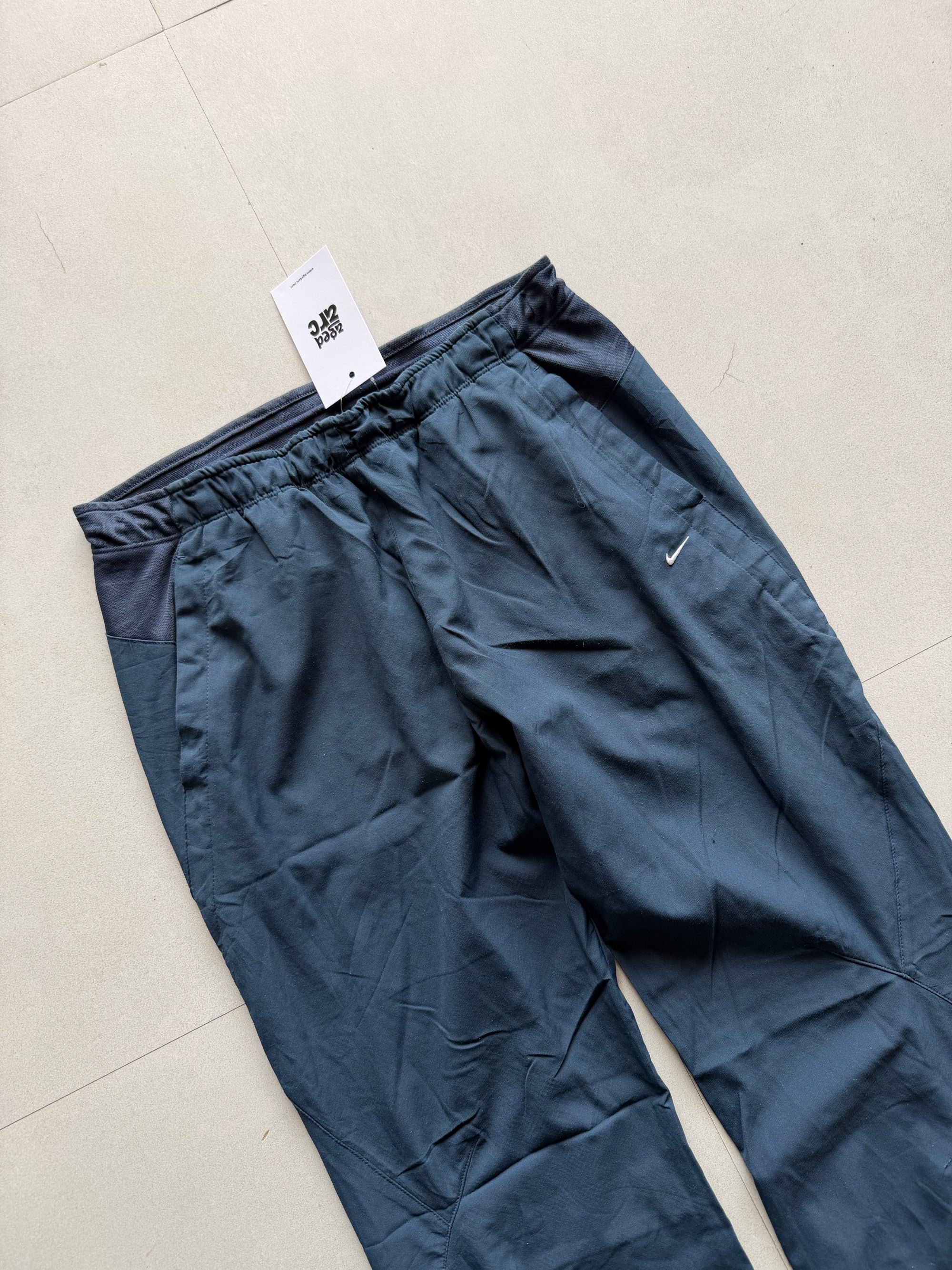 NIKE BAGGY TRACK PANT111 - S