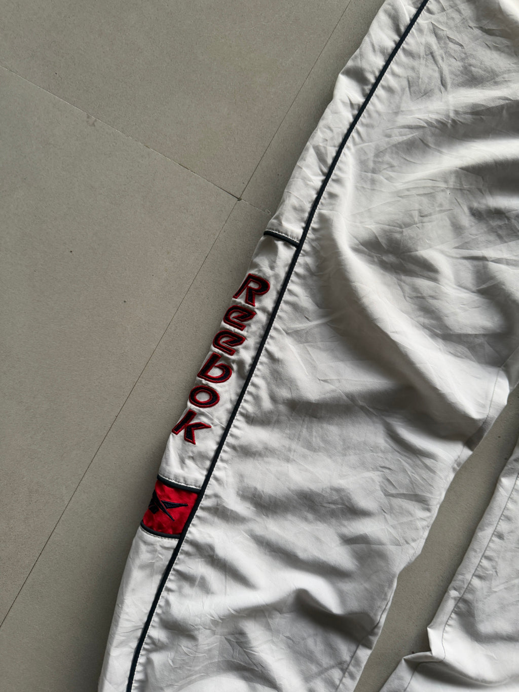 VINTAGE REEBOK SPELL-OUT TRACK - M