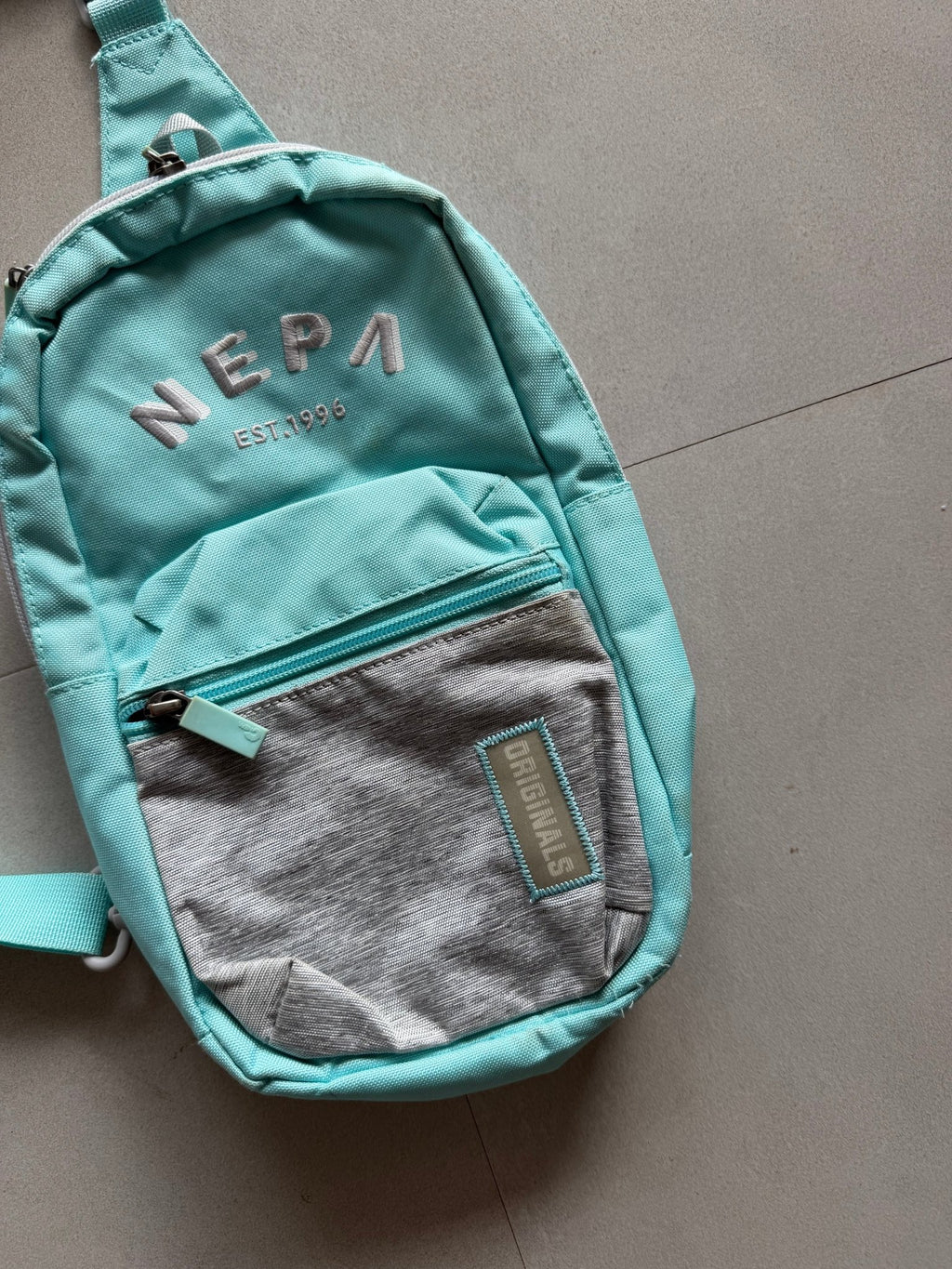 NEPA CROSS BODYBAG - Aged Arc